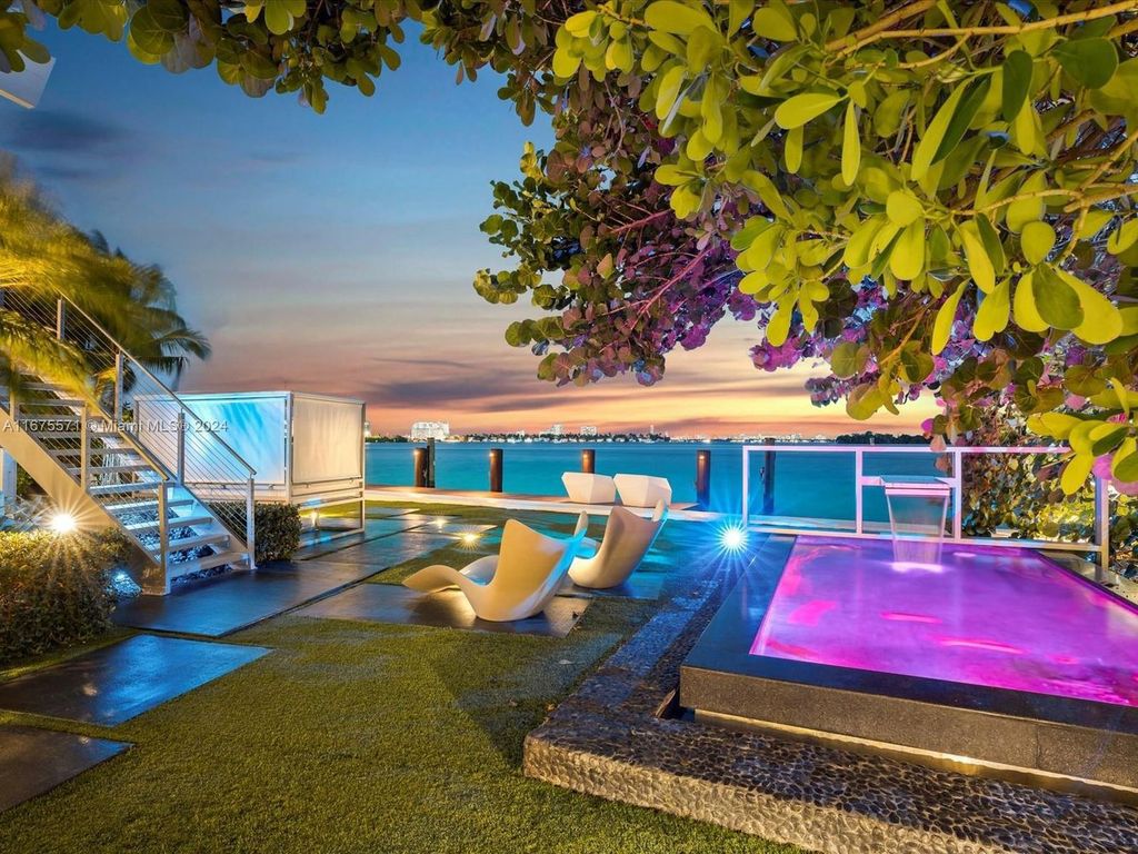 $14.8 Million Modern Glass Masterpiece with Bay Views and Suspended Pool on Belle Meade Island, Miami