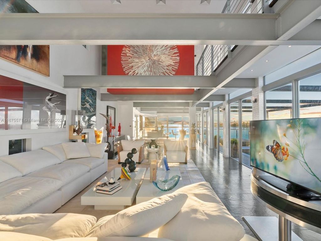 $14.8 Million Modern Glass Masterpiece with Bay Views and Suspended Pool on Belle Meade Island, Miami