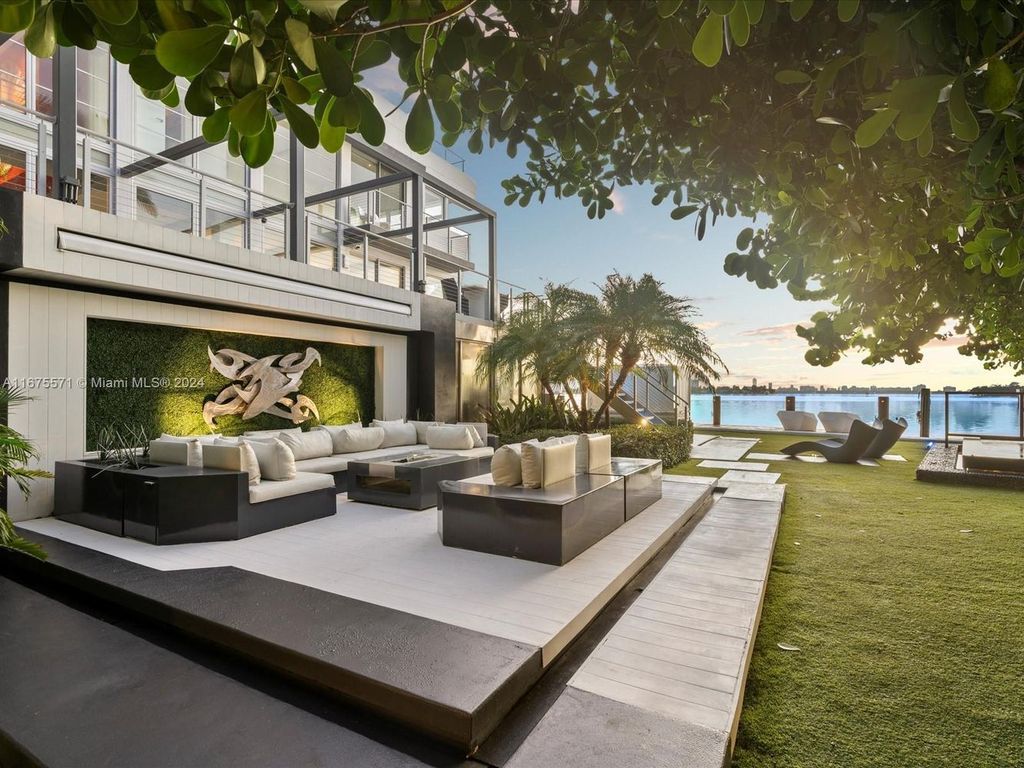 $14.8 Million Modern Glass Masterpiece with Bay Views and Suspended Pool on Belle Meade Island, Miami