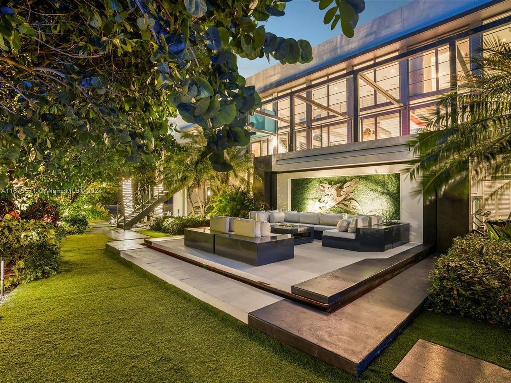 $14.8 Million Modern Glass Masterpiece with Bay Views and Suspended Pool on Belle Meade Island, Miami