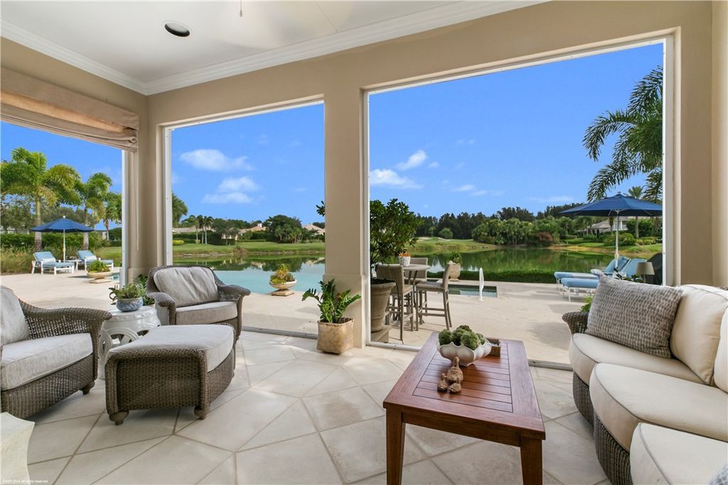 $4.7 Million Lakefront Estate in Orchid Island with Infinity Pool and Golf Course Views