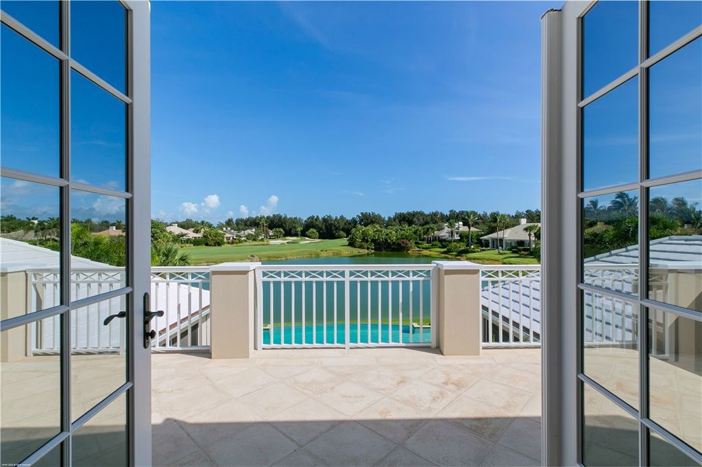 $4.7 Million Lakefront Estate in Orchid Island with Infinity Pool and Golf Course Views