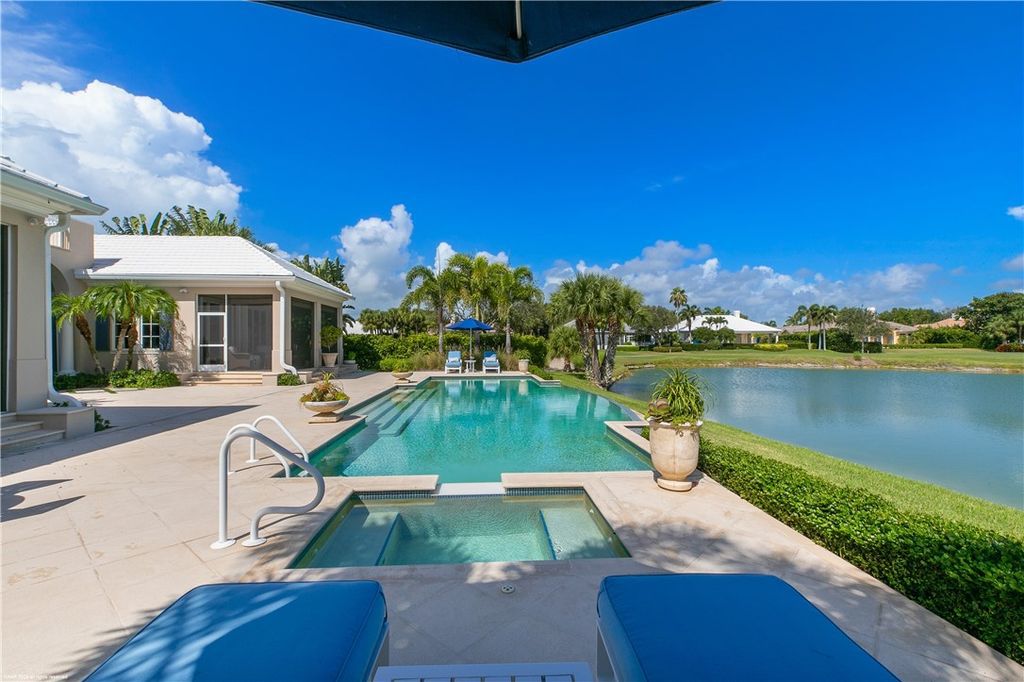 $4.7 Million Lakefront Estate in Orchid Island with Infinity Pool and Golf Course Views