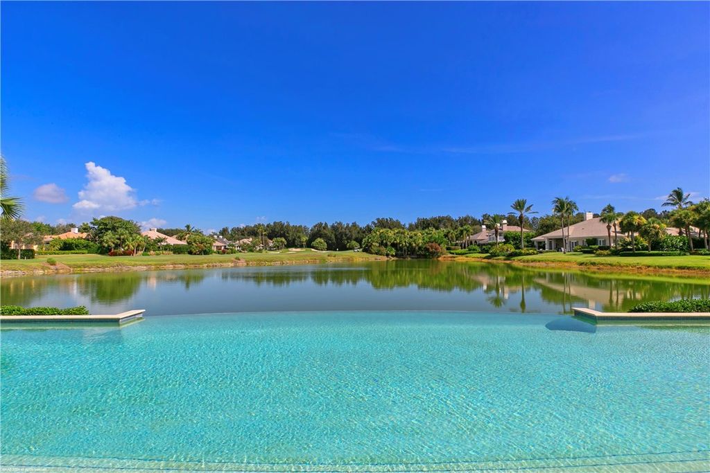 $4.7 Million Lakefront Estate in Orchid Island with Infinity Pool and Golf Course Views