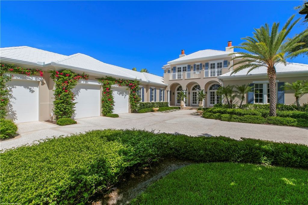 $4.7 Million Lakefront Estate in Orchid Island with Infinity Pool and Golf Course Views