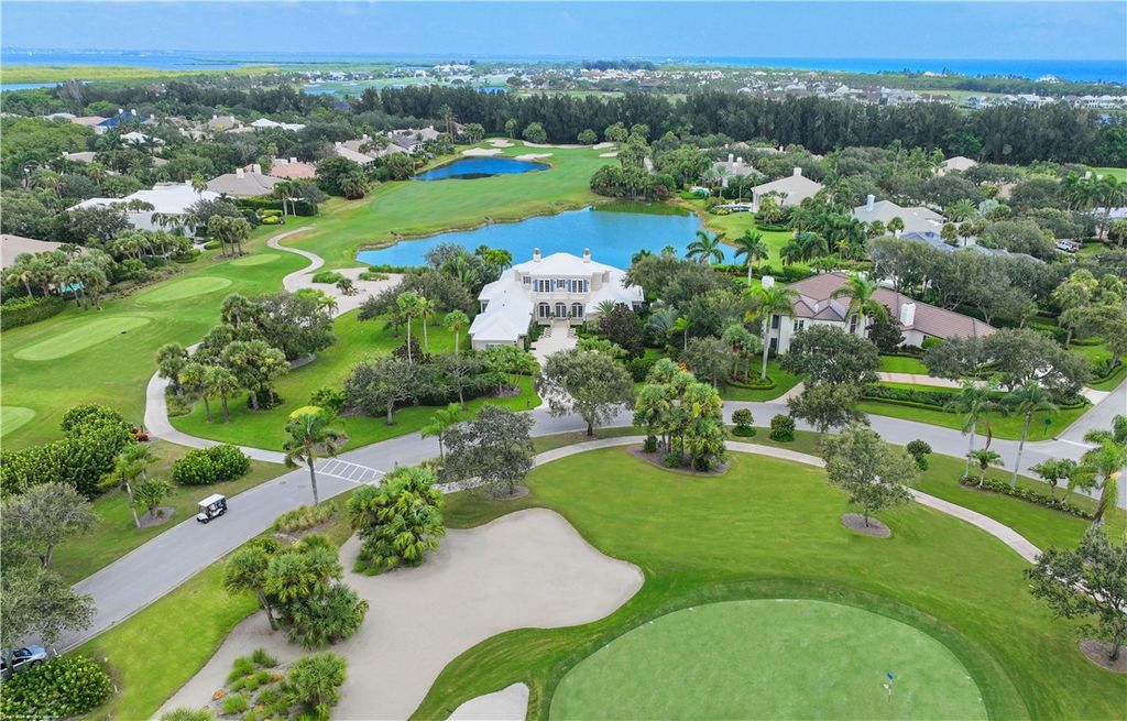 $4.7 Million Lakefront Estate in Orchid Island with Infinity Pool and Golf Course Views