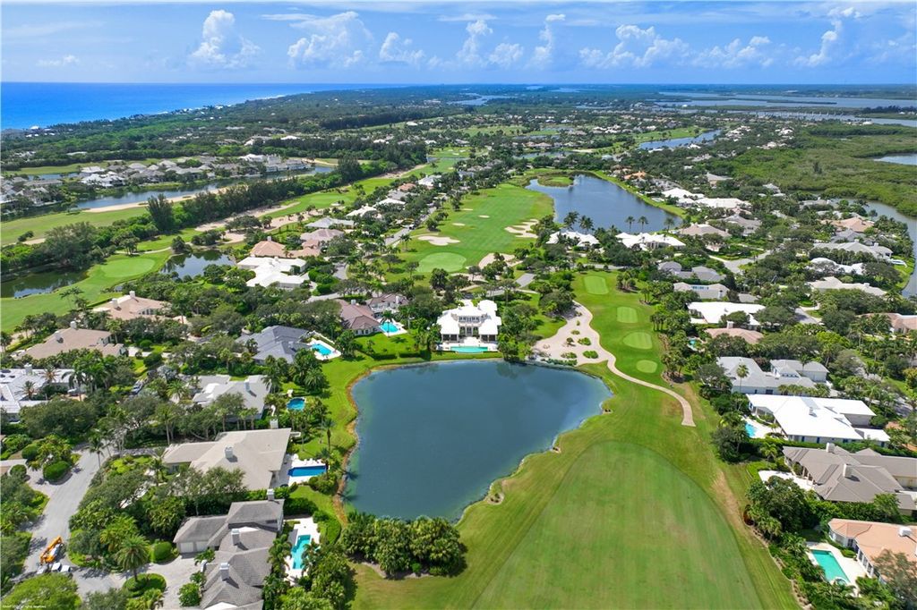 $4.7 Million Lakefront Estate in Orchid Island with Infinity Pool and Golf Course Views