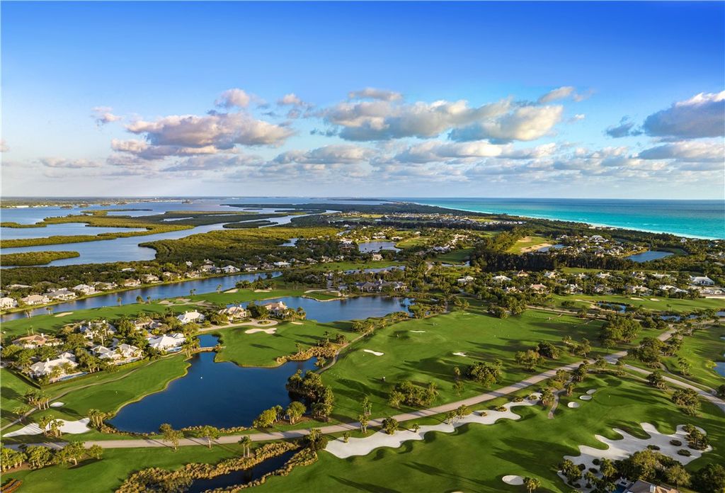 $4.7 Million Lakefront Estate in Orchid Island with Infinity Pool and Golf Course Views