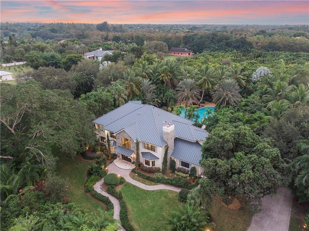 $6.5 Million Luxurious Estate in Parkland with Expansive Grounds for Unmatched Privacy