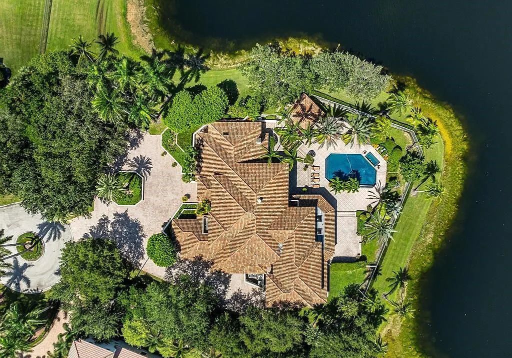 Exquisite $7.5 Million Waterfront Estate in Weston’s Prestigious Windmill Ranch Estates with Private Peninsula, and Scenic Views