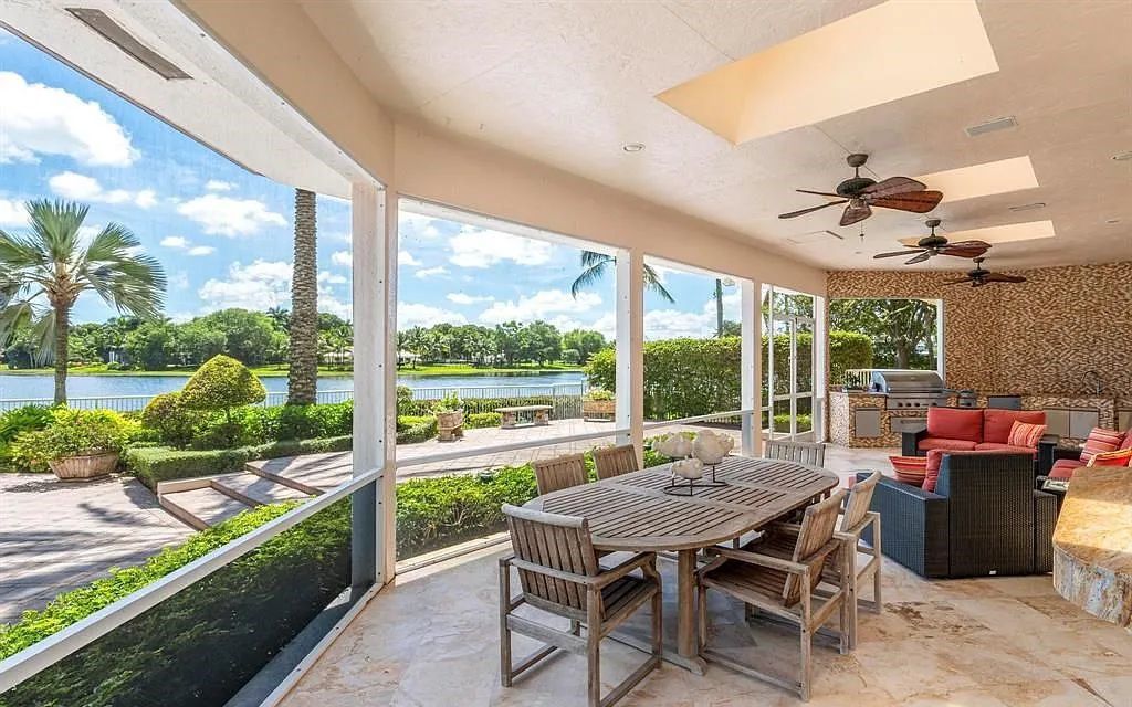 Exquisite $7.5 Million Waterfront Estate in Weston’s Prestigious Windmill Ranch Estates with Private Peninsula, and Scenic Views