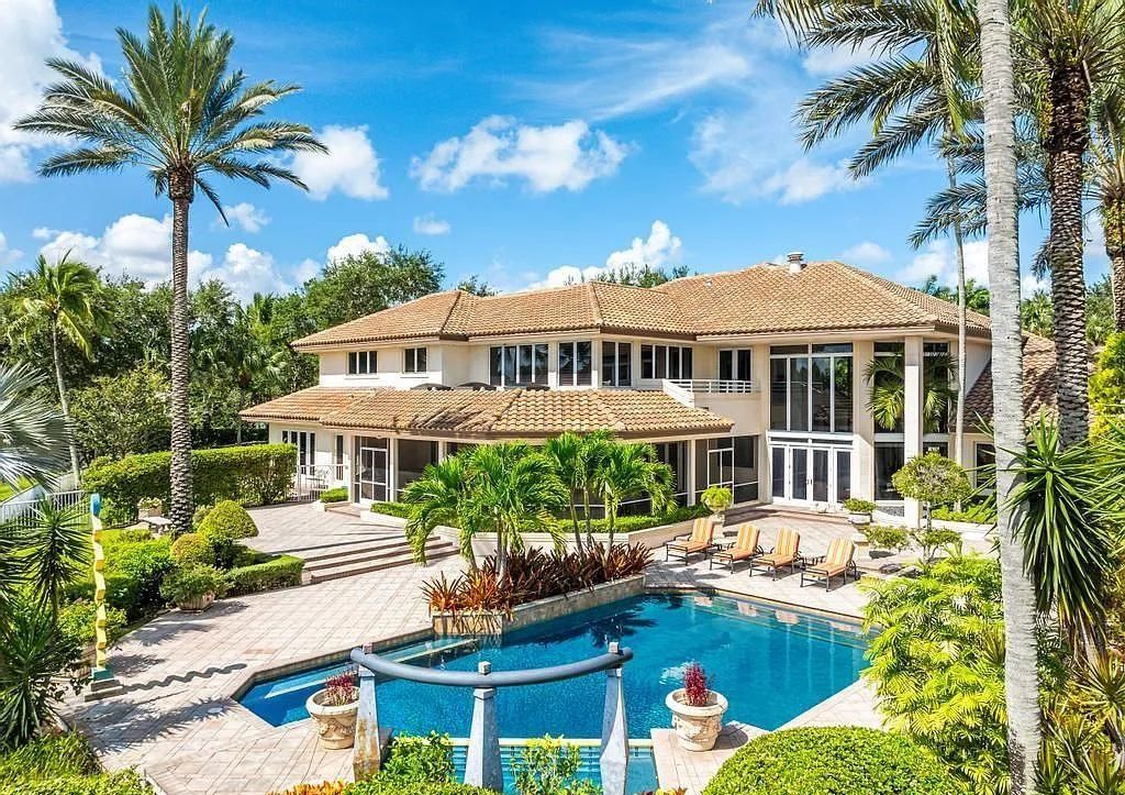 Exquisite $7.5 Million Waterfront Estate in Weston’s Prestigious Windmill Ranch Estates with Private Peninsula, and Scenic Views