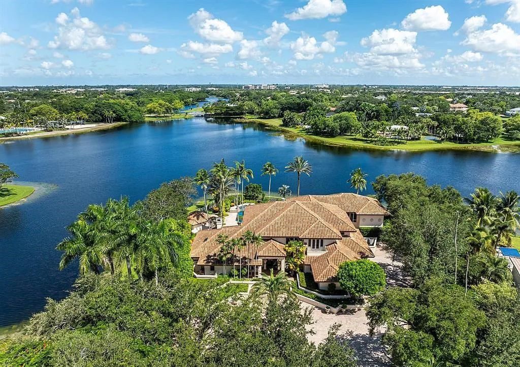 Exquisite $7.5 Million Waterfront Estate in Weston’s Prestigious Windmill Ranch Estates with Private Peninsula, and Scenic Views