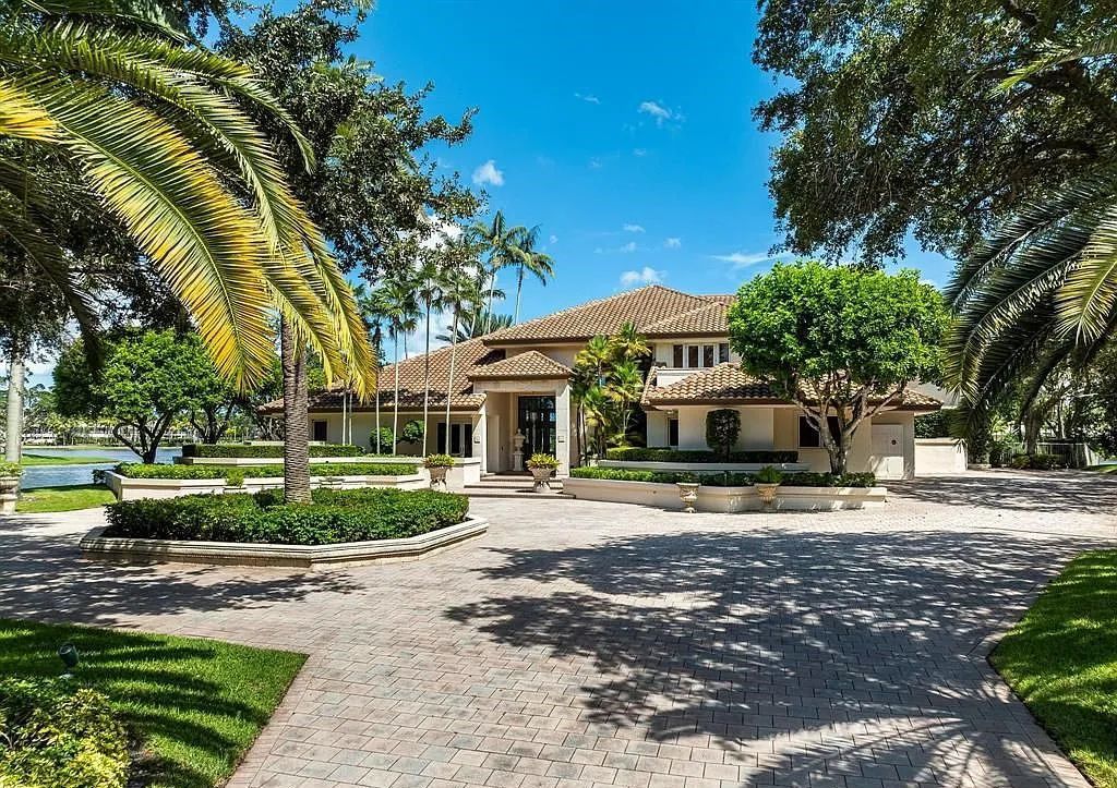 Exquisite $7.5 Million Waterfront Estate in Weston’s Prestigious Windmill Ranch Estates with Private Peninsula, and Scenic Views