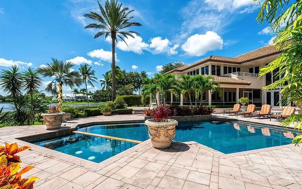 Exquisite $7.5 Million Waterfront Estate in Weston’s Prestigious Windmill Ranch Estates with Private Peninsula, and Scenic Views