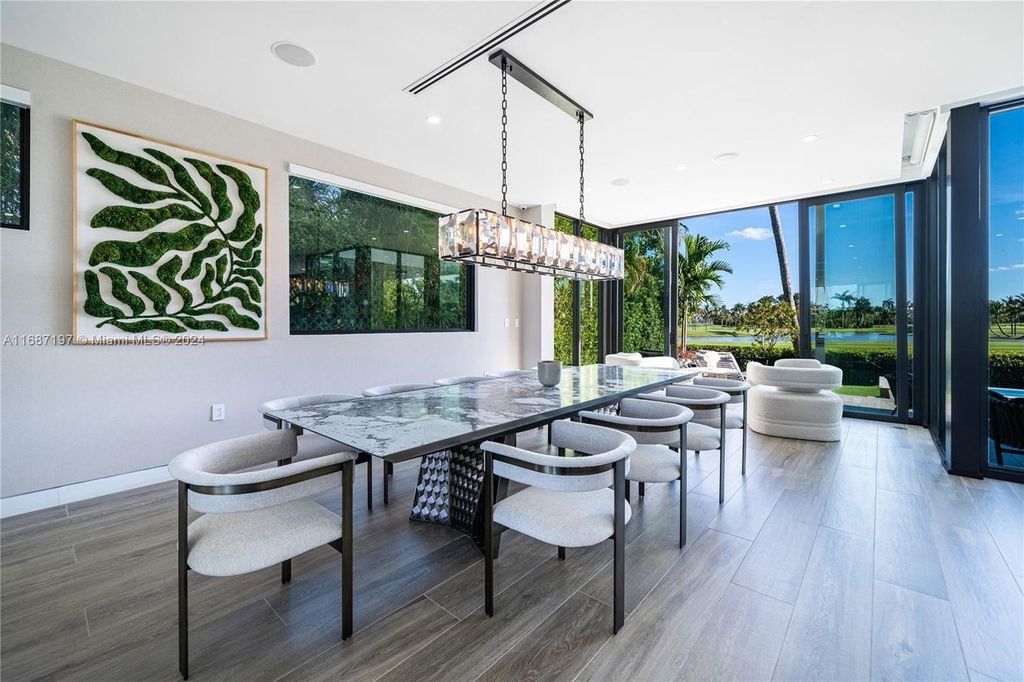 $11.3 Million Luxury Smart Home with Golf Course Views Saltwater Pool and Designer Features in Miami Beach