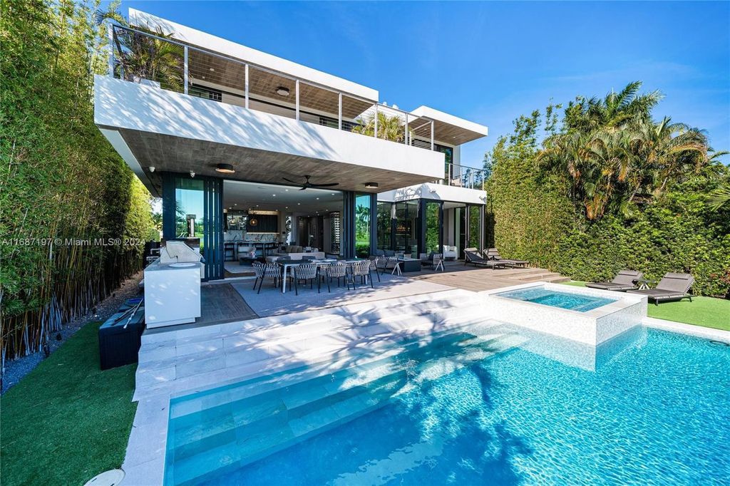 $11.3 Million Luxury Smart Home with Golf Course Views Saltwater Pool and Designer Features in Miami Beach