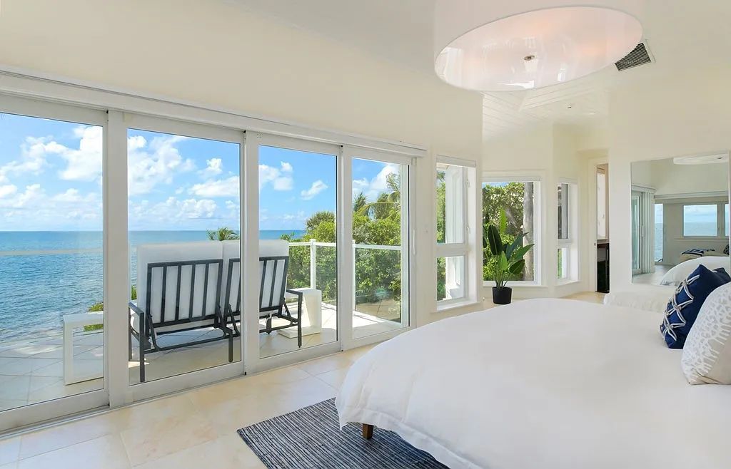 Exclusive $19.9 Million Oceanfront Estate in Key Largo with Private Beach and Marina Slip