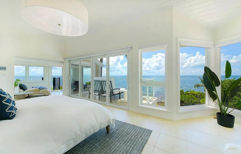 Exclusive $19.9 Million Oceanfront Estate in Key Largo with Private Beach and Marina Slip