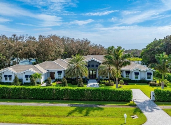 Luxurious $9 Million Coastal Modern Estate in Naples with Lakefront Lanai and Private Beach in Pine Ridge Estates