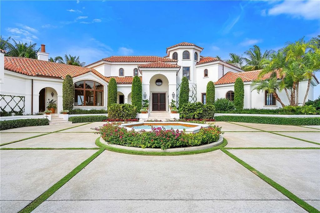 Located in the prestigious Little Harbour community, this magnificent Mizner-inspired Cote d'Azur estate offers 5 bedrooms, 7 full baths, and 2 half baths across 6,812± square feet.