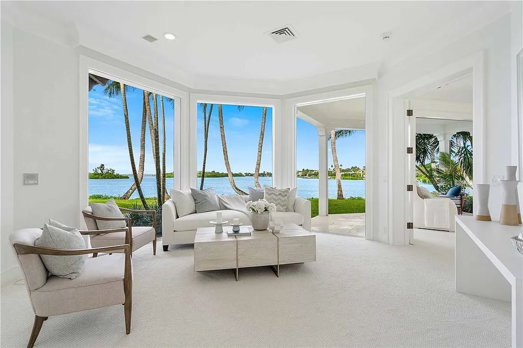 Located in the prestigious Little Harbour community, this magnificent Mizner-inspired Cote d'Azur estate offers 5 bedrooms, 7 full baths, and 2 half baths across 6,812± square feet.