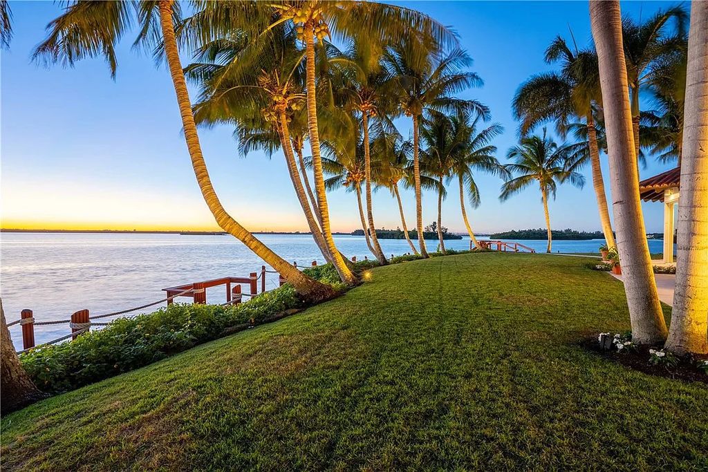 Located in the prestigious Little Harbour community, this magnificent Mizner-inspired Cote d'Azur estate offers 5 bedrooms, 7 full baths, and 2 half baths across 6,812± square feet.