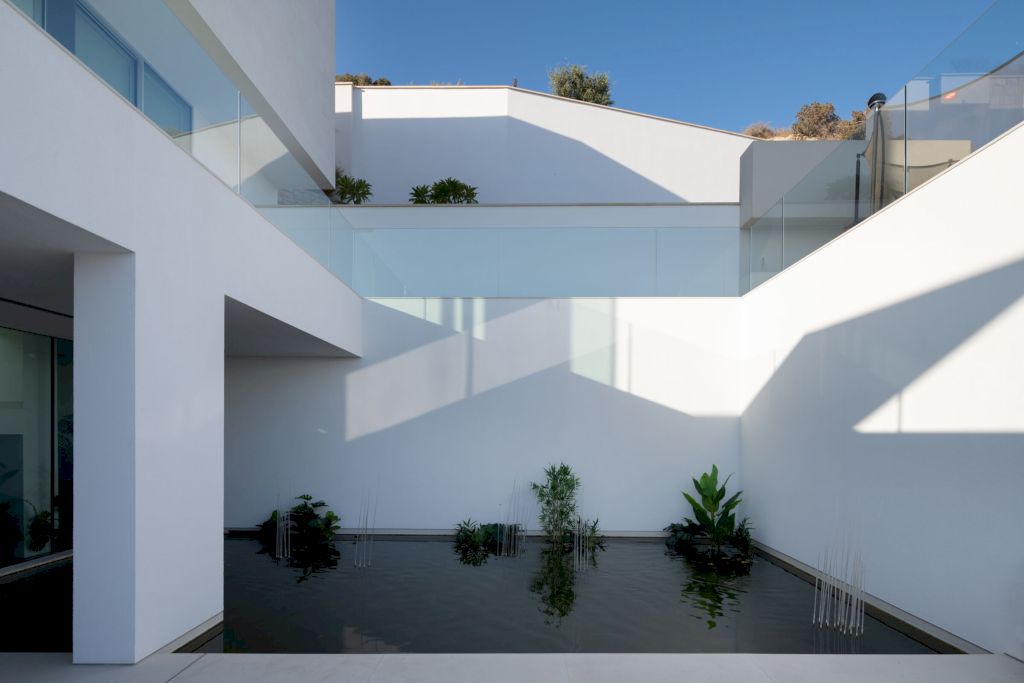 Everyday Vacation House, A white house by VOX Architects