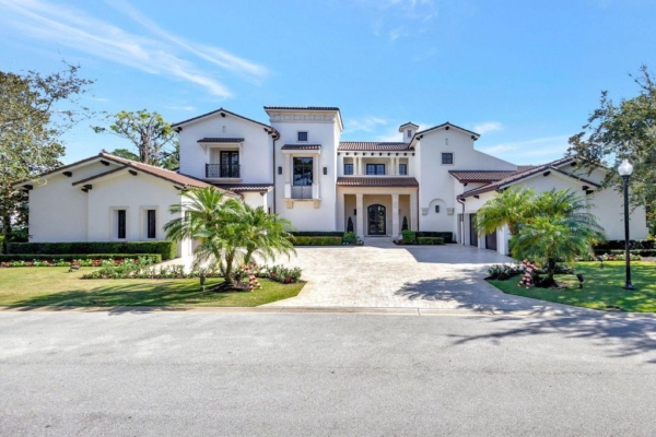 Stunning $14.5 Million Custom Estate in The Bears Club Jupiter with Lavish Amenities and Resort-Style Living