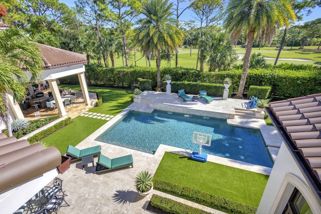 Stunning $14.5 Million Custom Estate in The Bears Club Jupiter with Lavish Amenities and Resort-Style Living