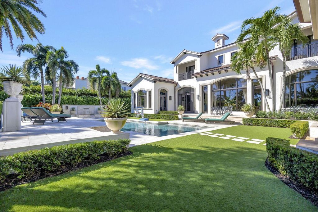 Stunning $14.5 Million Custom Estate in The Bears Club Jupiter with Lavish Amenities and Resort-Style Living