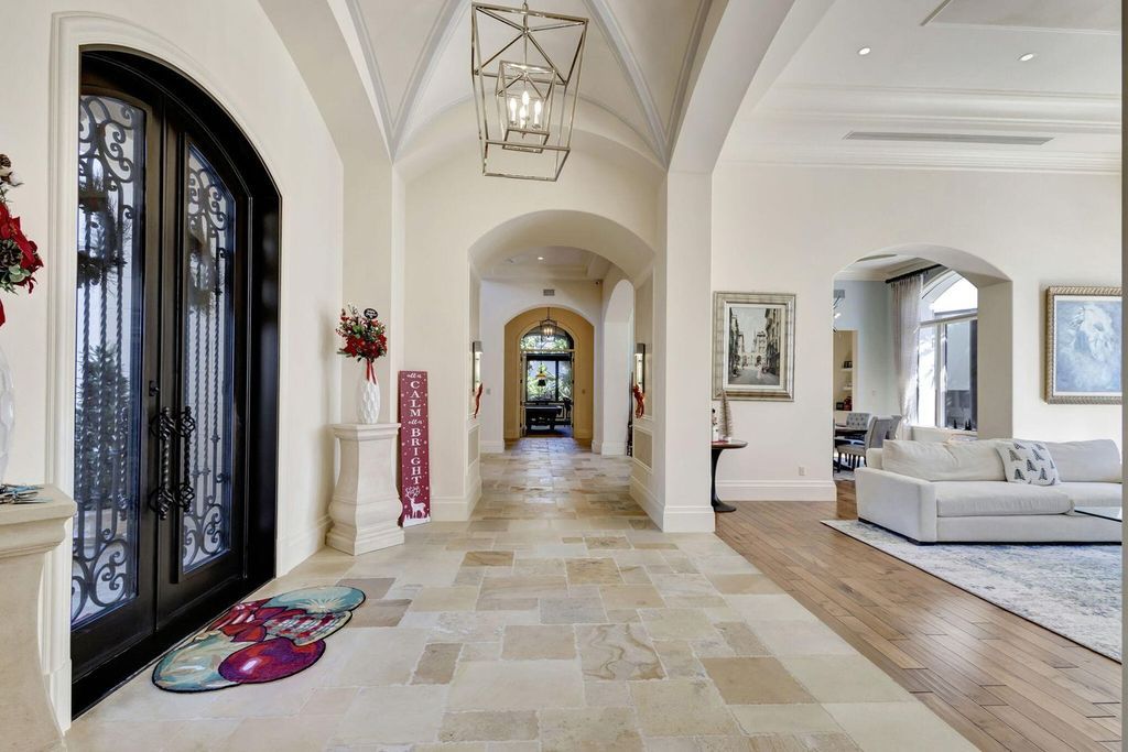 Stunning $14.5 Million Custom Estate in The Bears Club Jupiter with Lavish Amenities and Resort-Style Living