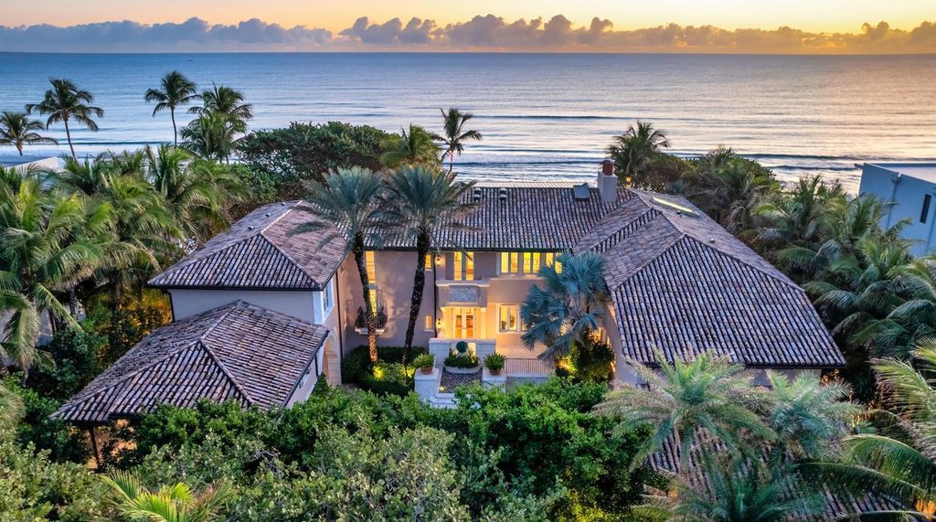 This stunning 8-bedroom, 9-bathroom estate spans 9,855 square feet and evokes the charm of Lake Como’s iconic villas. Designed by John Saladino, it blends rustic sophistication with grand elegance, featuring hand-hewn wood beams, reclaimed terra cotta floors, plaster walls, and a Tejas Borja tile roof.