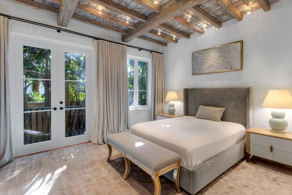 This stunning 8-bedroom, 9-bathroom estate spans 9,855 square feet and evokes the charm of Lake Como’s iconic villas. Designed by John Saladino, it blends rustic sophistication with grand elegance, featuring hand-hewn wood beams, reclaimed terra cotta floors, plaster walls, and a Tejas Borja tile roof.