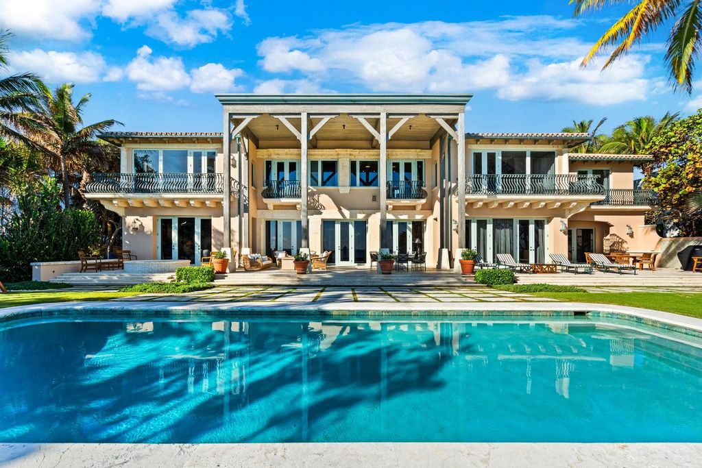 This stunning 8-bedroom, 9-bathroom estate spans 9,855 square feet and evokes the charm of Lake Como’s iconic villas. Designed by John Saladino, it blends rustic sophistication with grand elegance, featuring hand-hewn wood beams, reclaimed terra cotta floors, plaster walls, and a Tejas Borja tile roof.