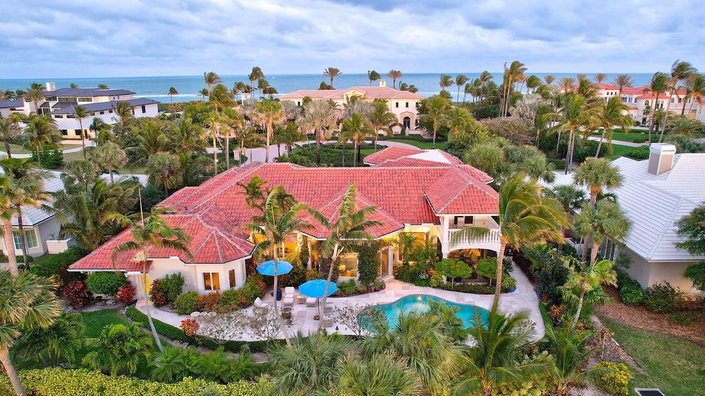 Discover unparalleled luxury at 2995 SE Dune Drive, Stuart, FL, an exquisite Sailfish Point estate located on the renowned Jack Nicklaus 'Signature' golf course and just steps from the ocean.