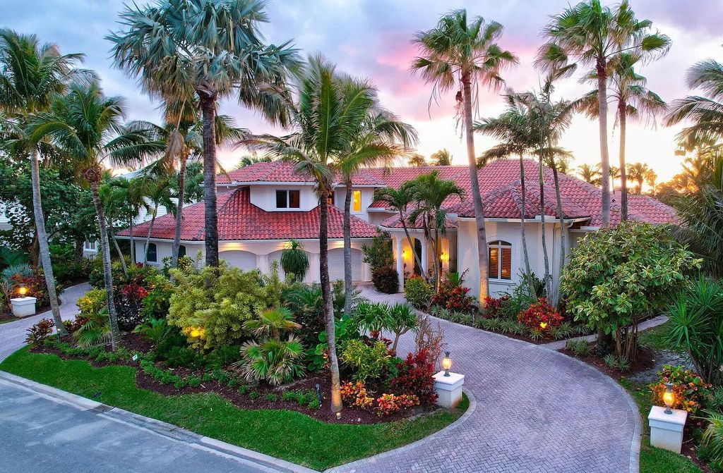 Discover unparalleled luxury at 2995 SE Dune Drive, Stuart, FL, an exquisite Sailfish Point estate located on the renowned Jack Nicklaus 'Signature' golf course and just steps from the ocean.