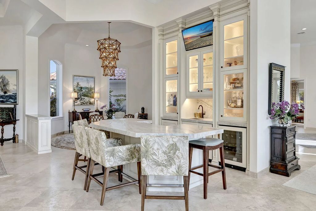 Discover unparalleled luxury at 2995 SE Dune Drive, Stuart, FL, an exquisite Sailfish Point estate located on the renowned Jack Nicklaus 'Signature' golf course and just steps from the ocean.