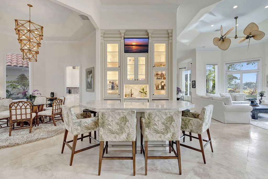 Discover unparalleled luxury at 2995 SE Dune Drive, Stuart, FL, an exquisite Sailfish Point estate located on the renowned Jack Nicklaus 'Signature' golf course and just steps from the ocean.