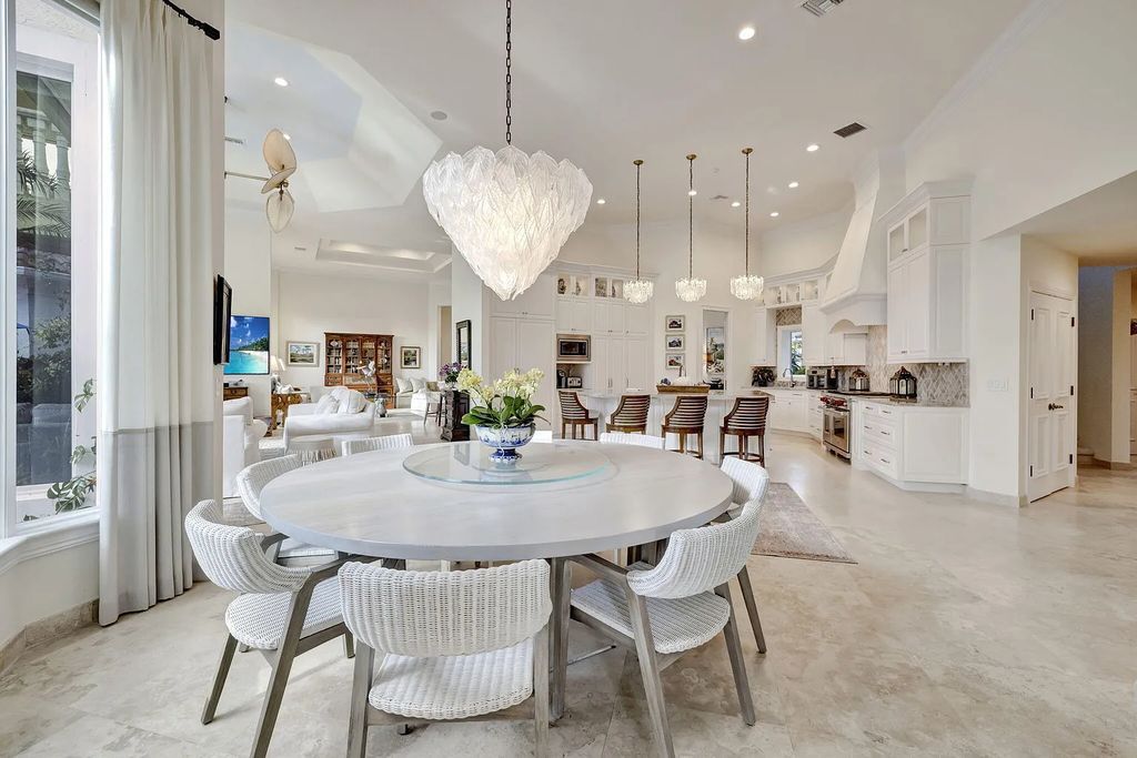 Discover unparalleled luxury at 2995 SE Dune Drive, Stuart, FL, an exquisite Sailfish Point estate located on the renowned Jack Nicklaus 'Signature' golf course and just steps from the ocean.