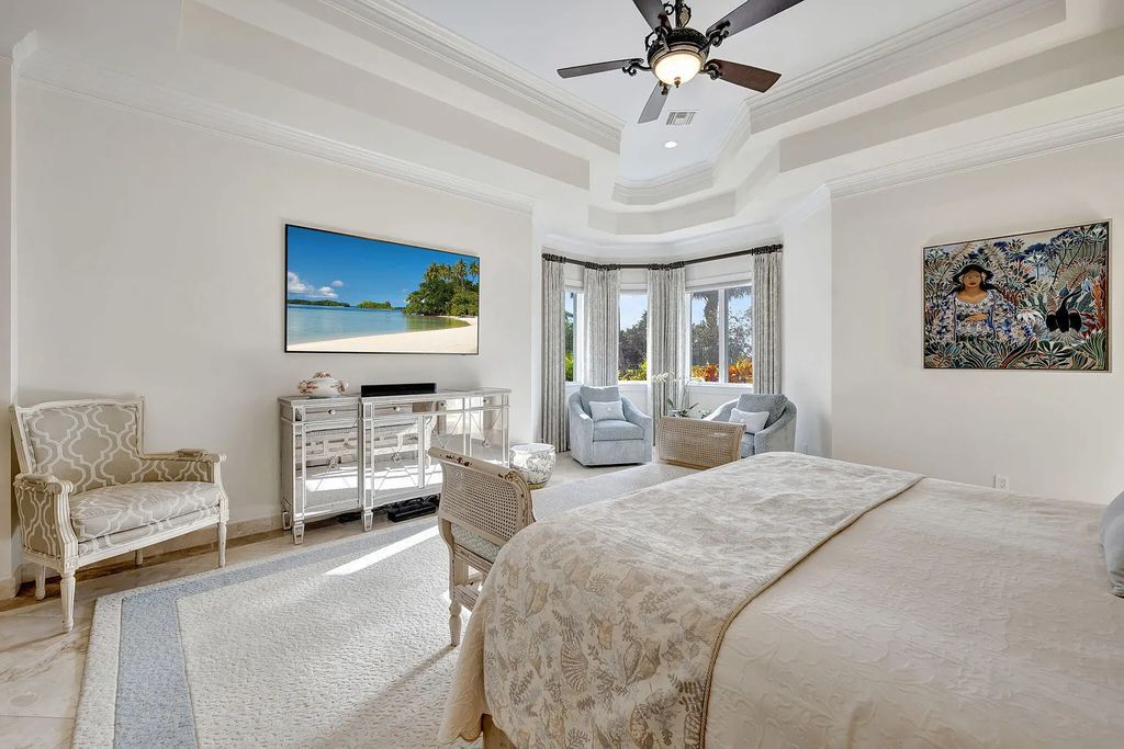 Discover unparalleled luxury at 2995 SE Dune Drive, Stuart, FL, an exquisite Sailfish Point estate located on the renowned Jack Nicklaus 'Signature' golf course and just steps from the ocean.