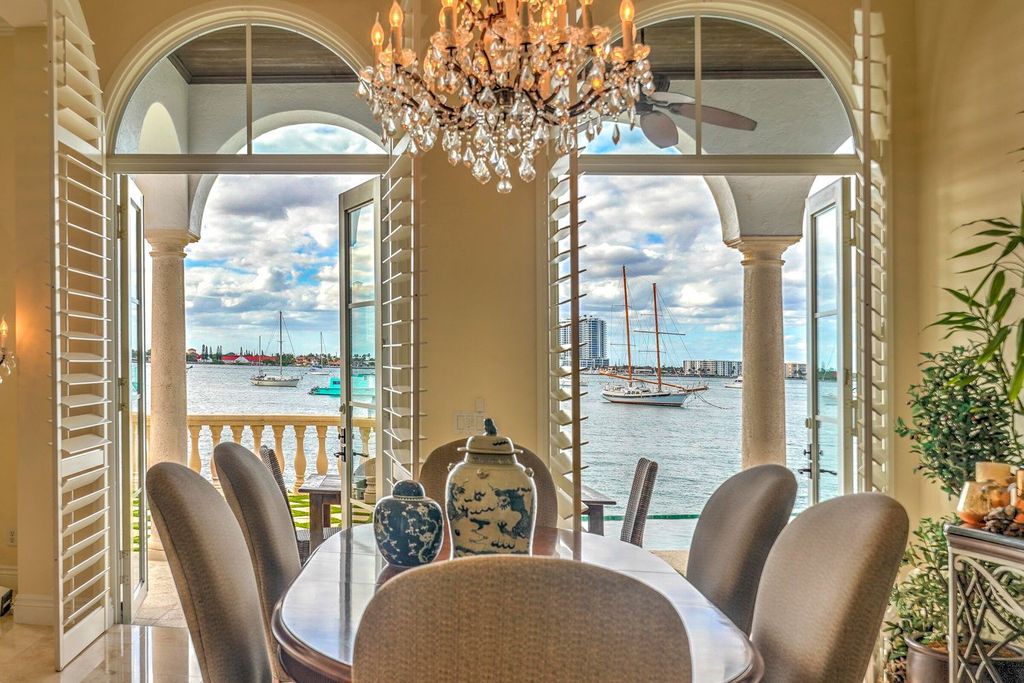 Designed with an open Mediterranean-inspired layout, this 4,034 square feet residence features an office, den, and expansive water views from every room. With 150 feet of waterfront, a 40,000-pound boat lift, and additional space for larger boats and jet skis, it’s a boater’s dream.