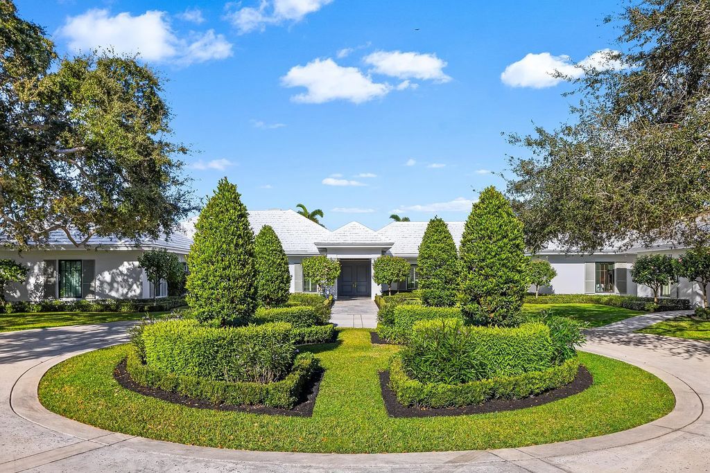 The 3-bedroom main residence features exquisite finishes, including chevron-patterned white oak floors, a striking octagonal living room, and a chef’s kitchen with dual walnut islands, Taj Mahal quartzite countertops, and Viking appliances.