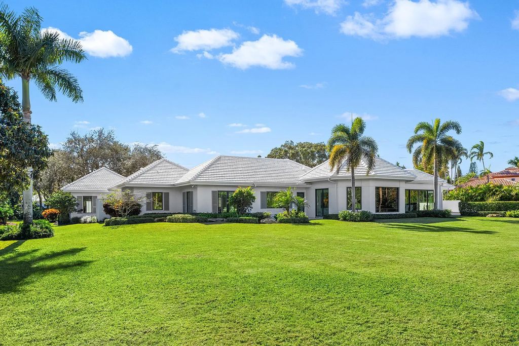 The 3-bedroom main residence features exquisite finishes, including chevron-patterned white oak floors, a striking octagonal living room, and a chef’s kitchen with dual walnut islands, Taj Mahal quartzite countertops, and Viking appliances.