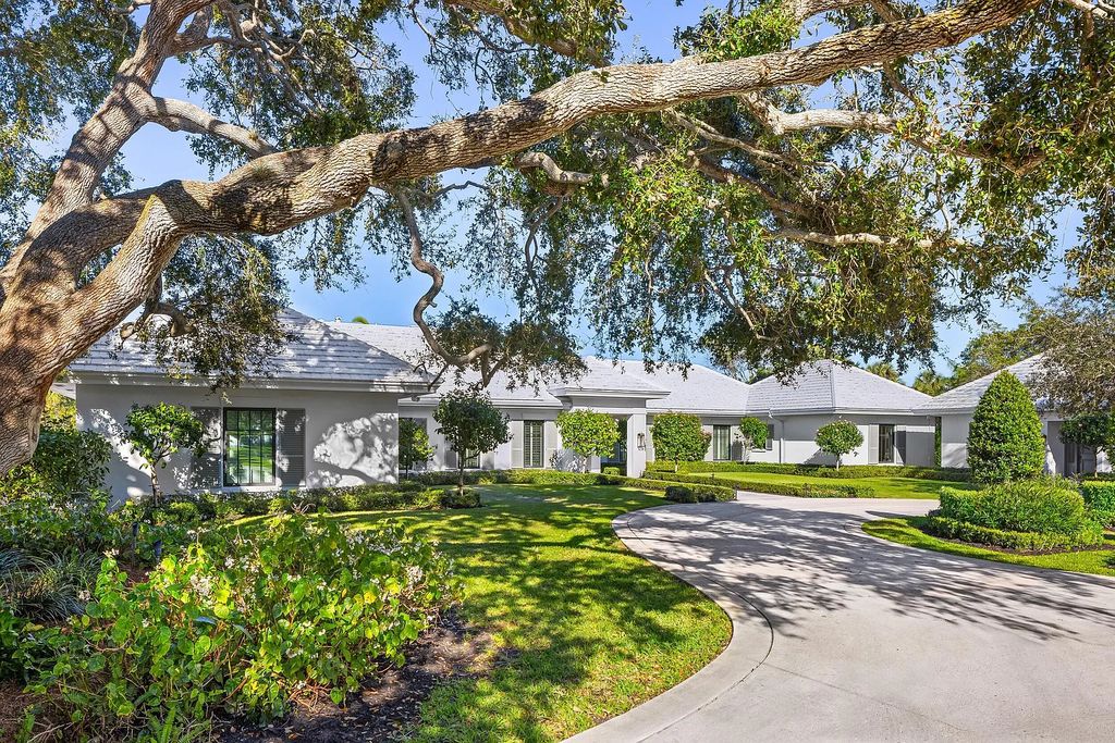 The 3-bedroom main residence features exquisite finishes, including chevron-patterned white oak floors, a striking octagonal living room, and a chef’s kitchen with dual walnut islands, Taj Mahal quartzite countertops, and Viking appliances.