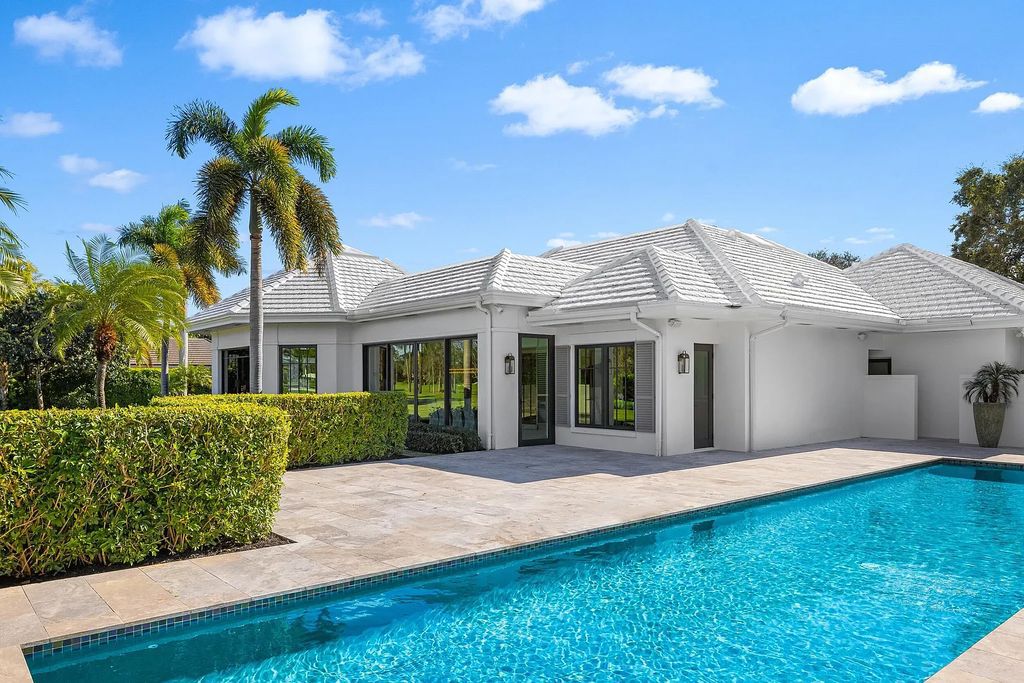 The 3-bedroom main residence features exquisite finishes, including chevron-patterned white oak floors, a striking octagonal living room, and a chef’s kitchen with dual walnut islands, Taj Mahal quartzite countertops, and Viking appliances.