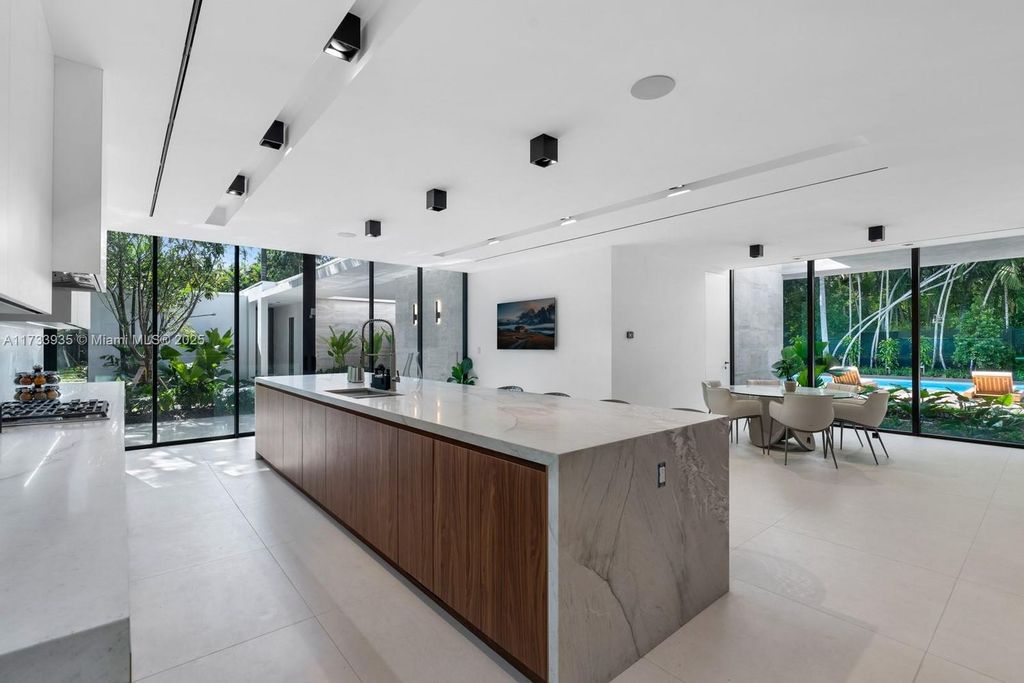 Contemporary Coconut Grove Estate with Guest House, Gym, Theater, and Resort-Style Pool for $24.9 Million