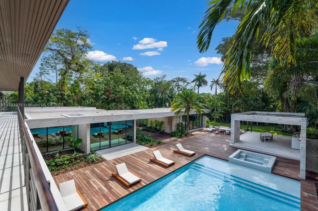 Contemporary Coconut Grove Estate with Guest House, Gym, Theater, and Resort-Style Pool for $24.9 Million