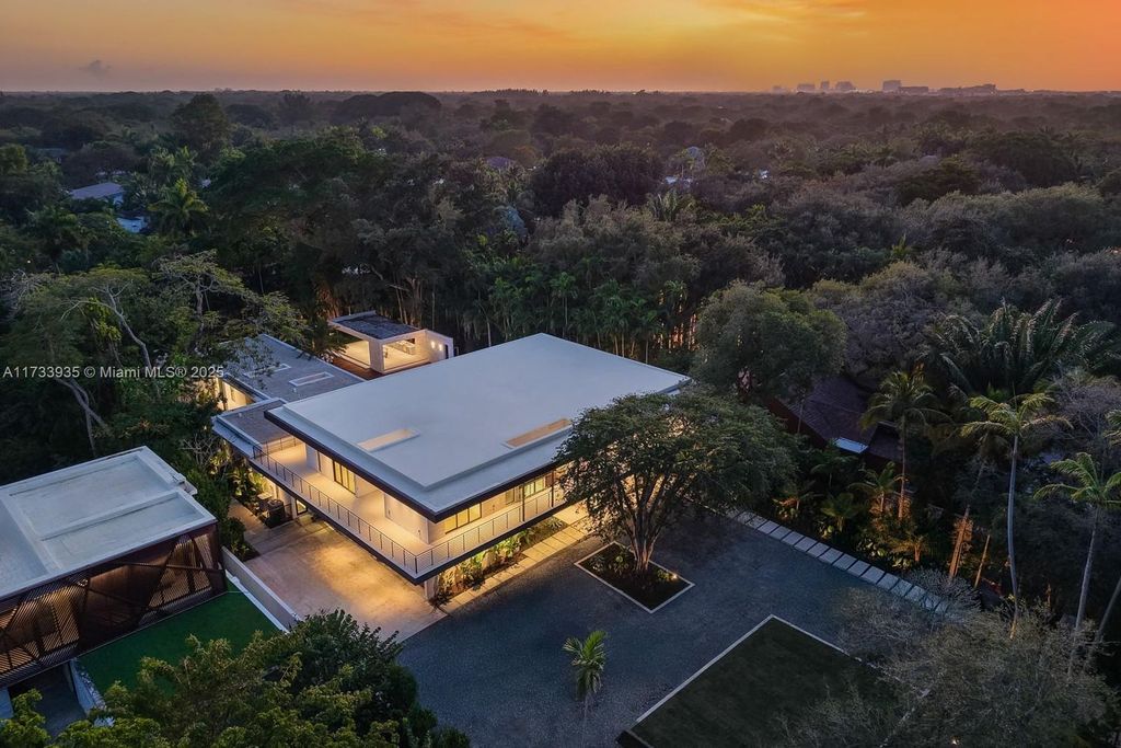 Contemporary Coconut Grove Estate with Guest House, Gym, Theater, and Resort-Style Pool for $24.9 Million