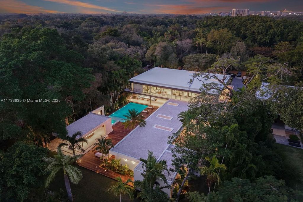 Contemporary Coconut Grove Estate with Guest House, Gym, Theater, and Resort-Style Pool for $24.9 Million